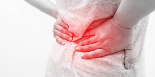 Back Pain and Nausea at the Same Time? Here’s Why